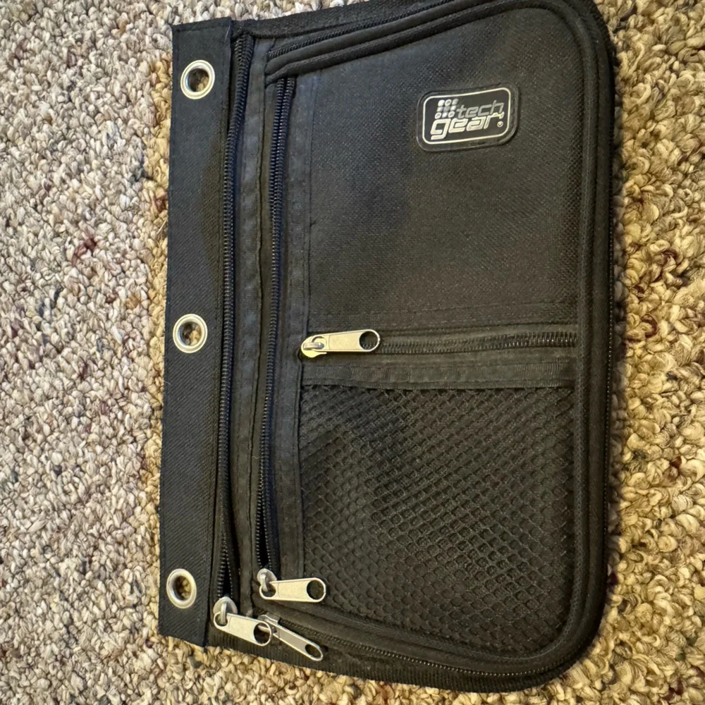 Black Zippered Pouch with Metal Accents